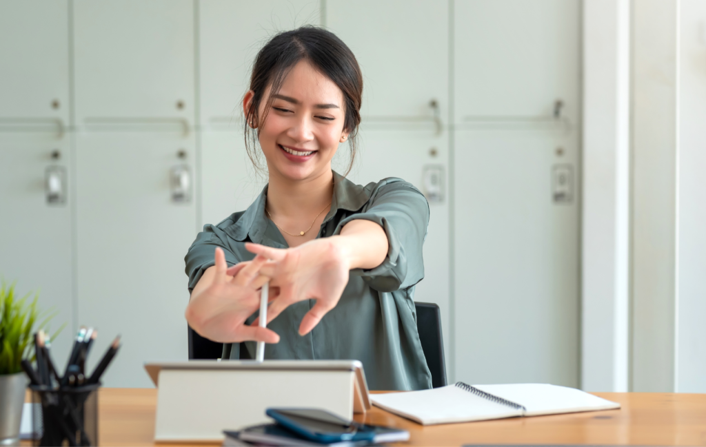 Woman extending hands and cracking knuckles