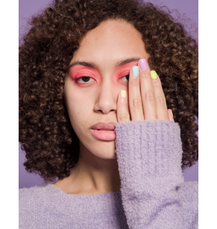 lady with pink eyeshadow covering 1 eye