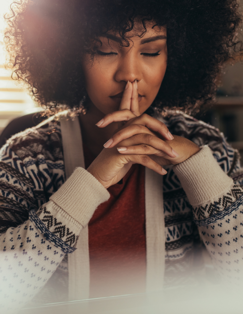 black woman praying