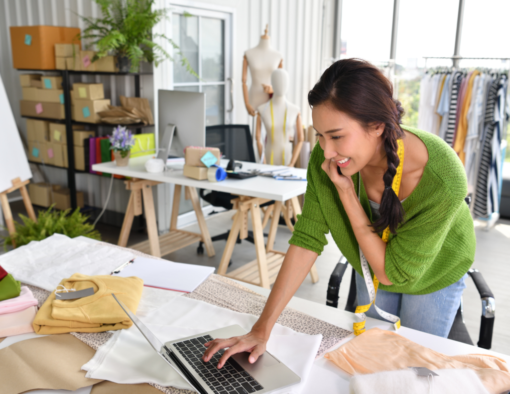 Woman Entrepreneur on computer and phone