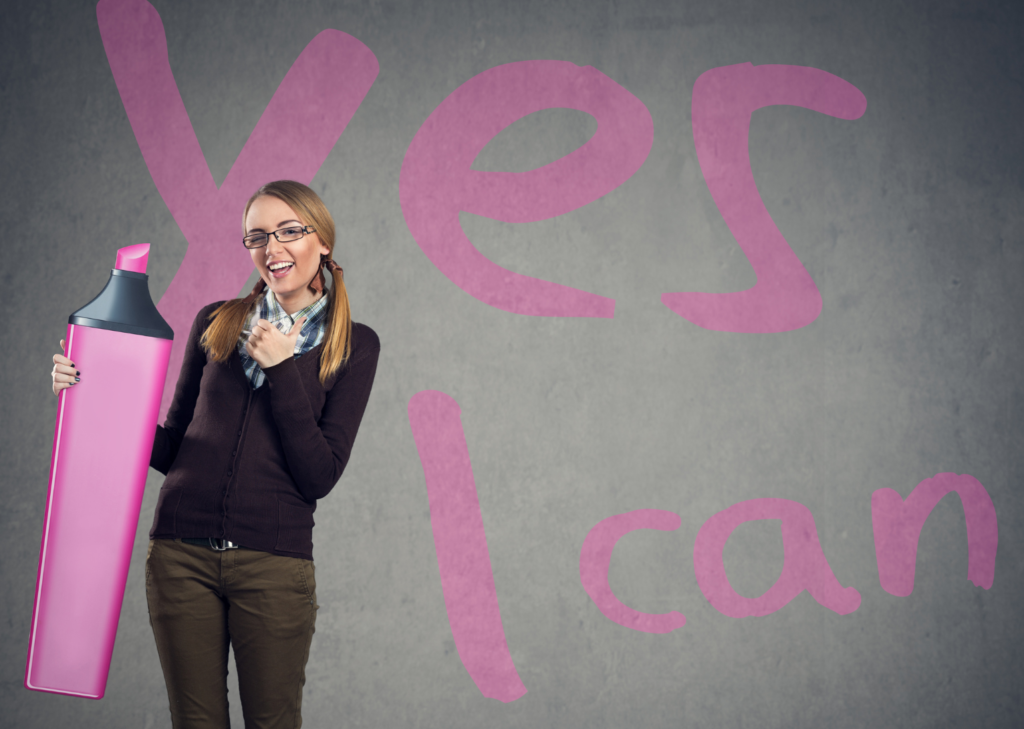 woman holding pink highlighter with words that say yes I can