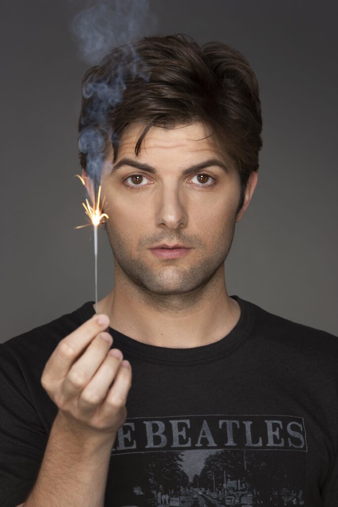 Adam Scott holding sparkler