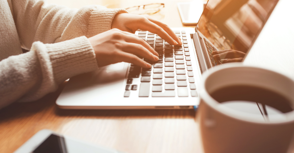 Female typing on laptop