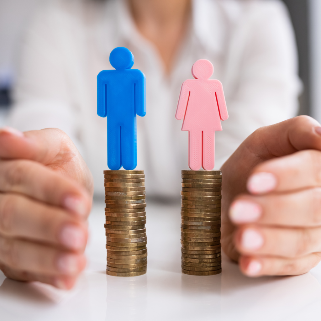 blue man and pink woman figures standing on stack of coins the same height