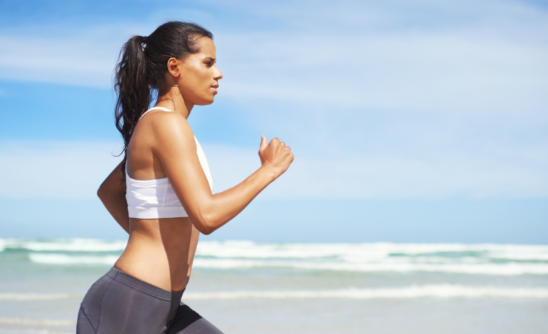 Woman-running-on-beach