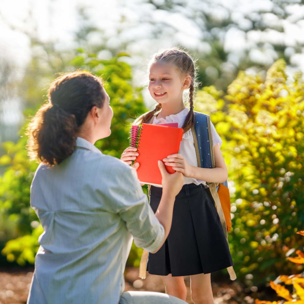 mom sending daughter off to school