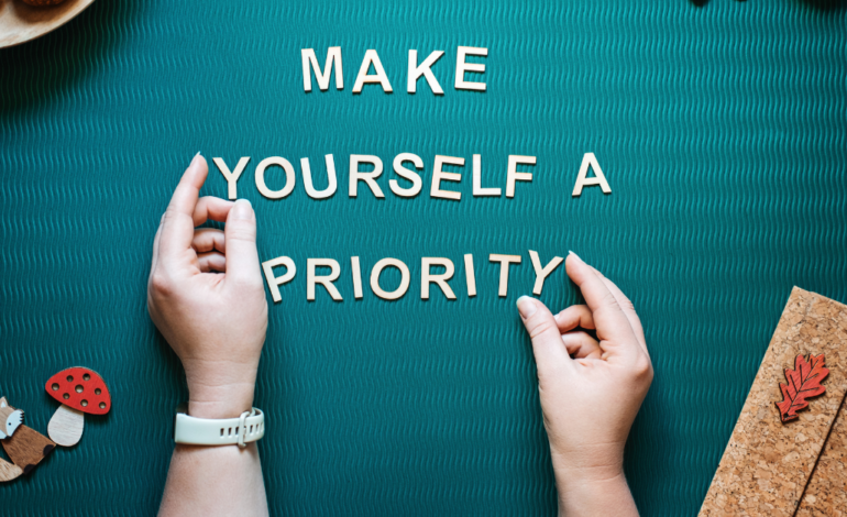 sign that says "make yourself a priority"