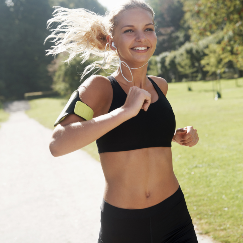 smiling woman running with energy