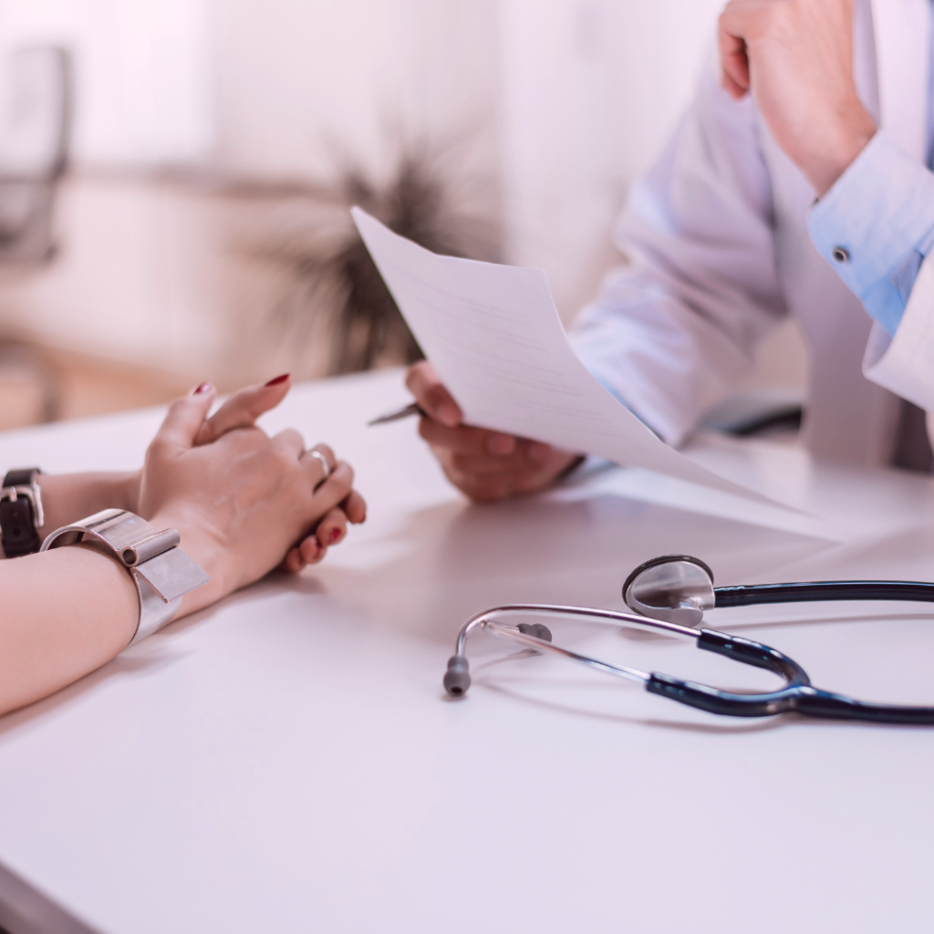 woman talking with doctor