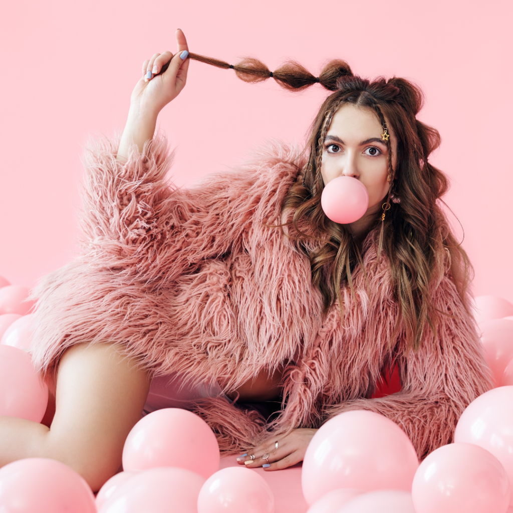 woman wearing pink in pink balloons