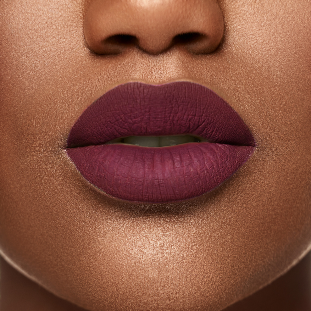 woman with dark cherry lipstick on