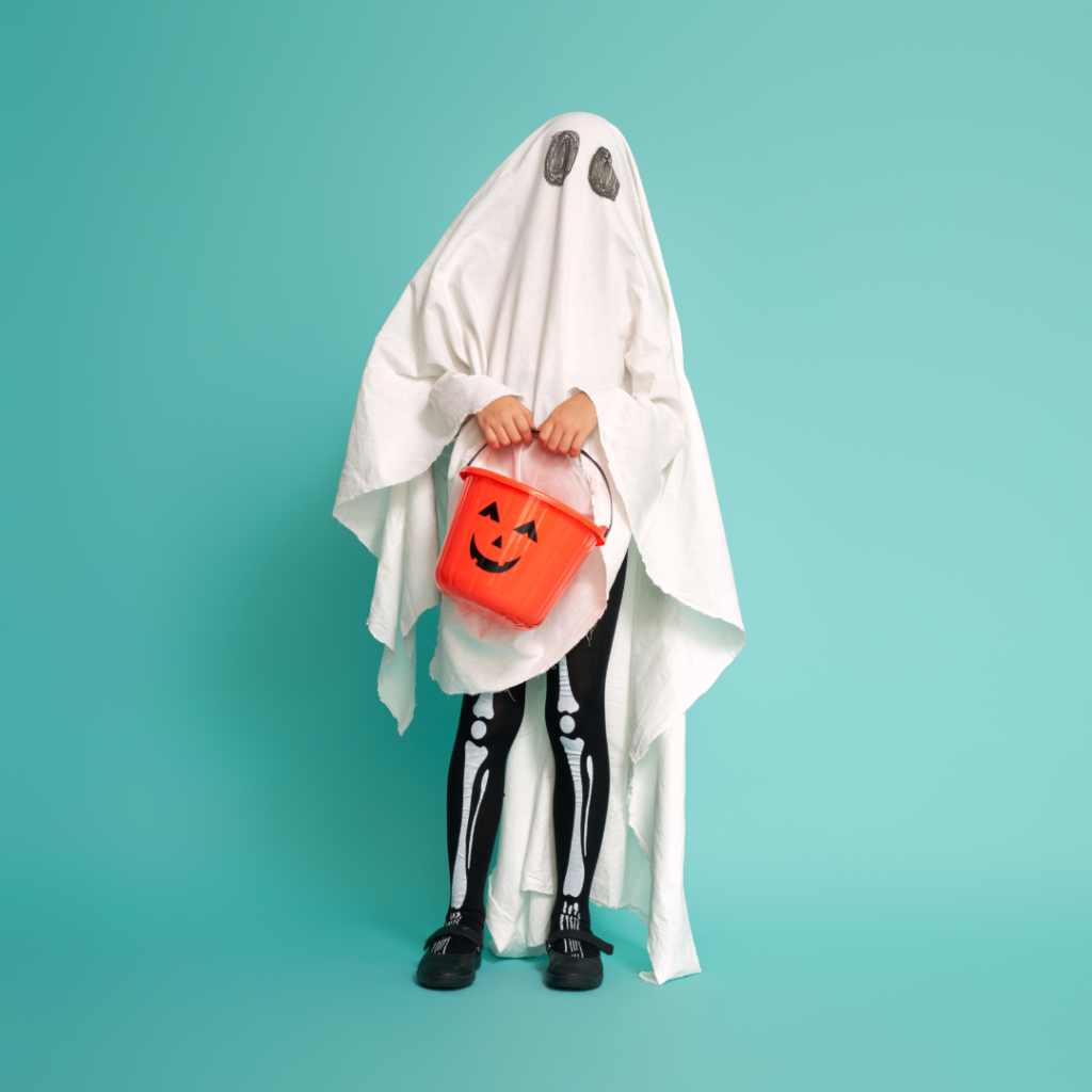 child in ghost costume