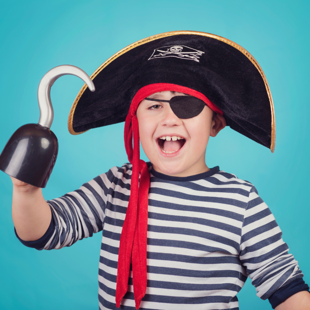 little boy in pirate costume