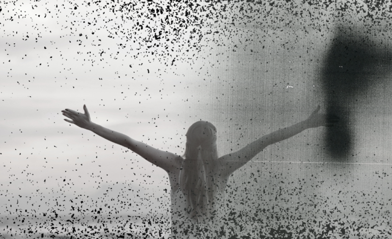 spooky photo of woman with arms up