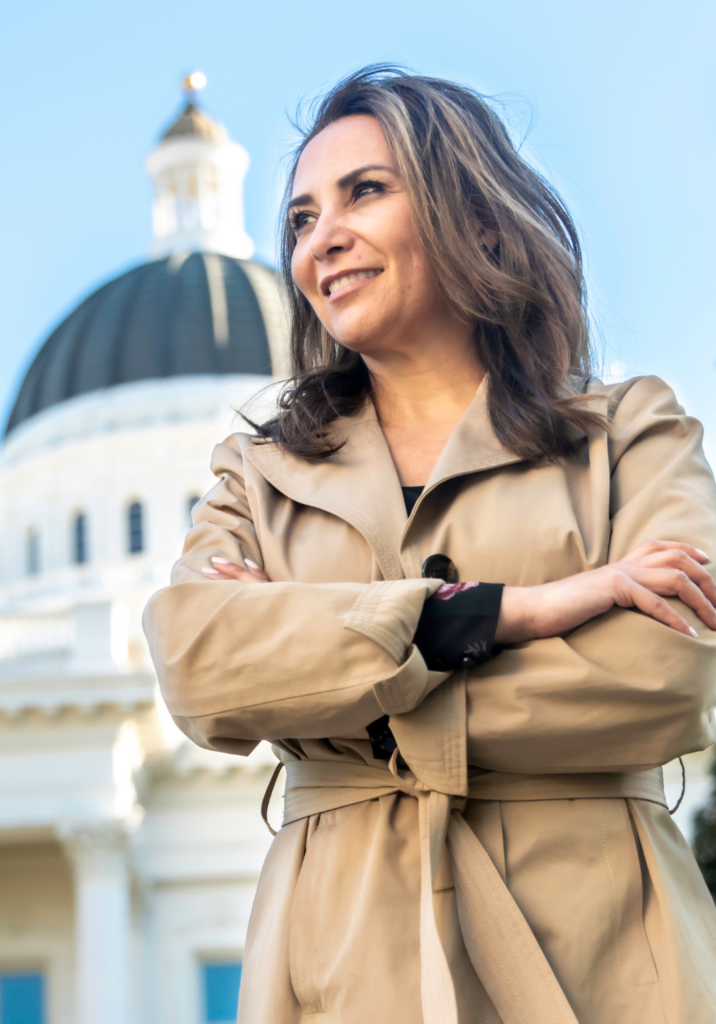 Female Politician standing in front of capital