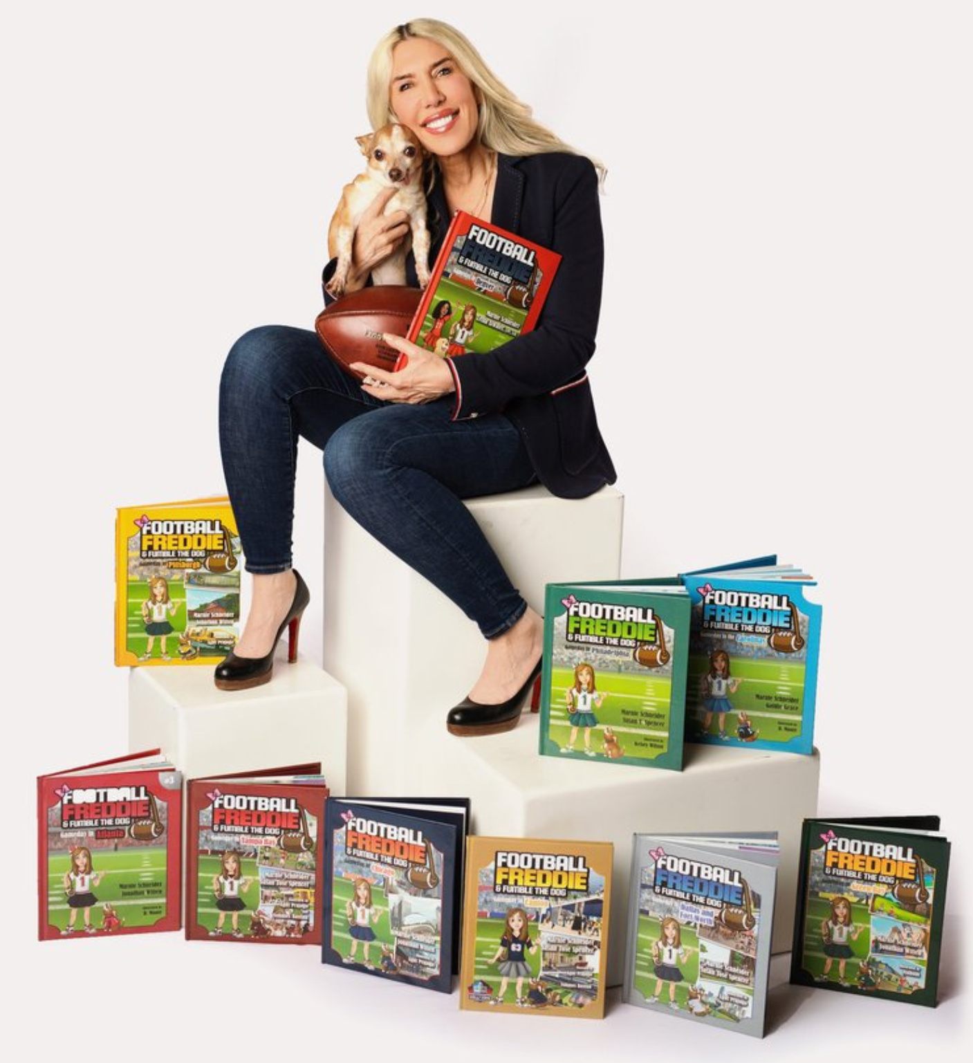 Marnie with Fumble the Dog and all her books