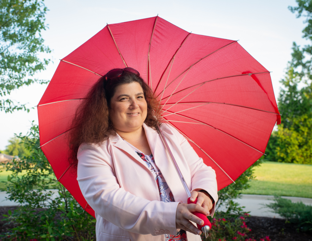 Niurka holding Amor Umbrella