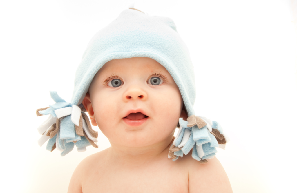 baby boy in blue hat