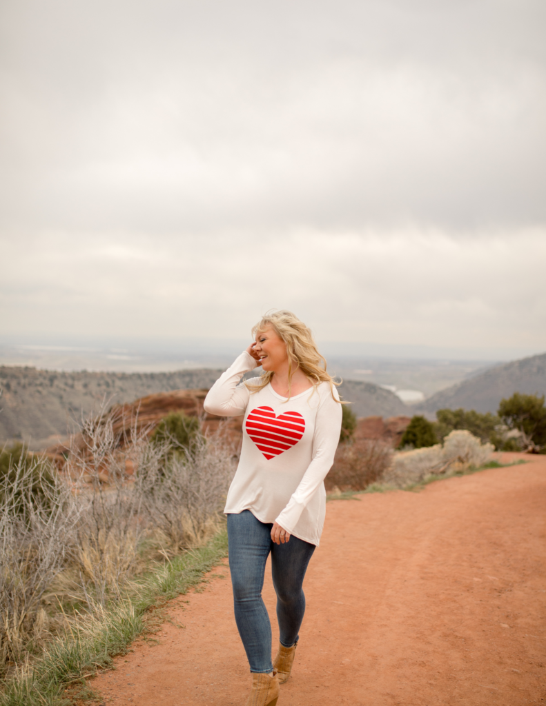 Kerrie Lee in heart shirt walking