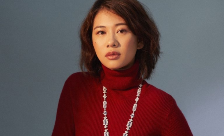 Pocket Sun Red Turtleneck with necklace