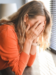 Woman hands on face