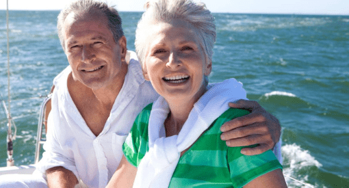 Couple on a boat smiling