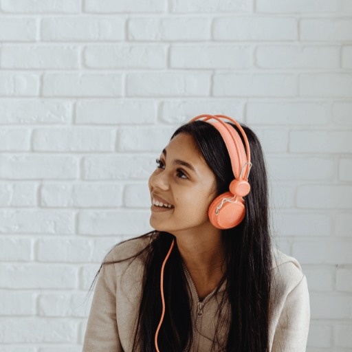 girl with pink headphones on