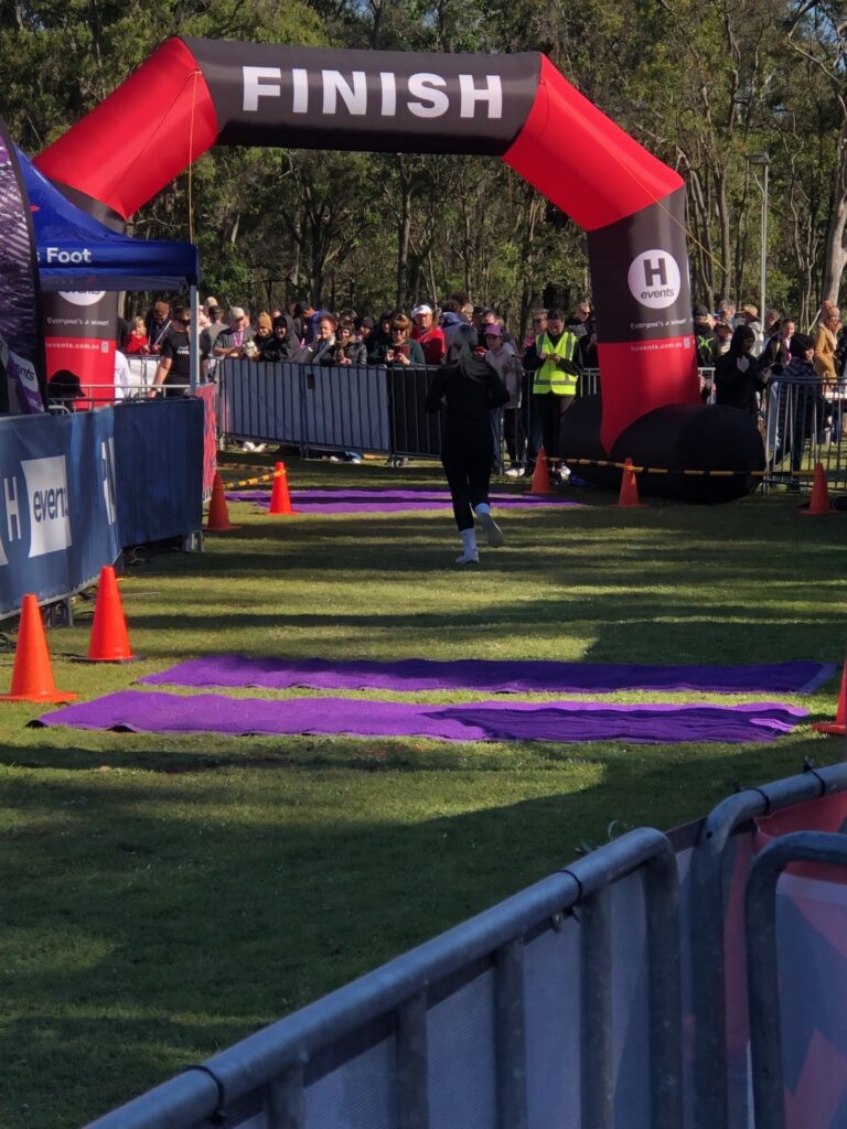 racer crossing finish line