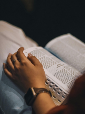 Woman reading the bible