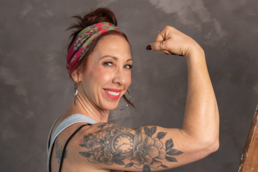 Woman flexing muscles